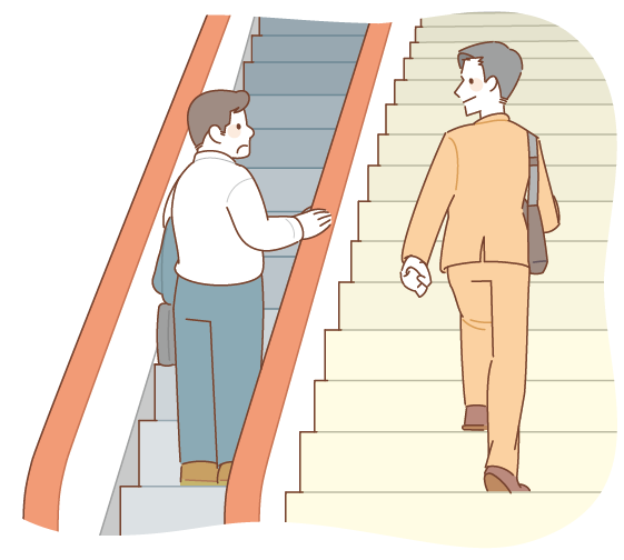 エスカレーターに乗る人を横目に颯爽と階段を上る男性