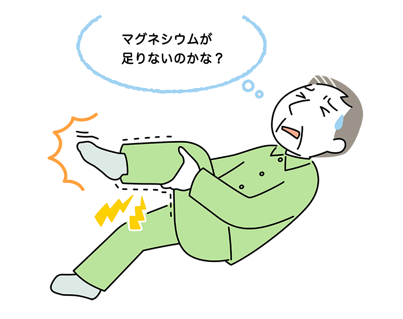 足がつって痛がっている60代男性