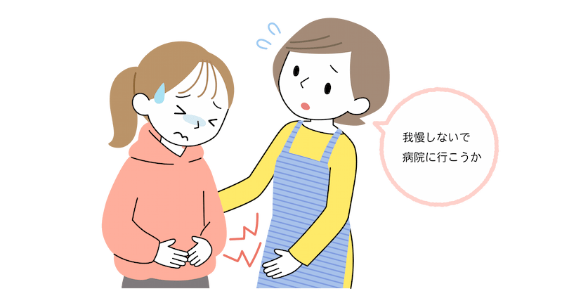 生理痛でお腹を痛がっている中学生の女の子に、お母さんが「我慢しないで病院に行こうか」と話している。