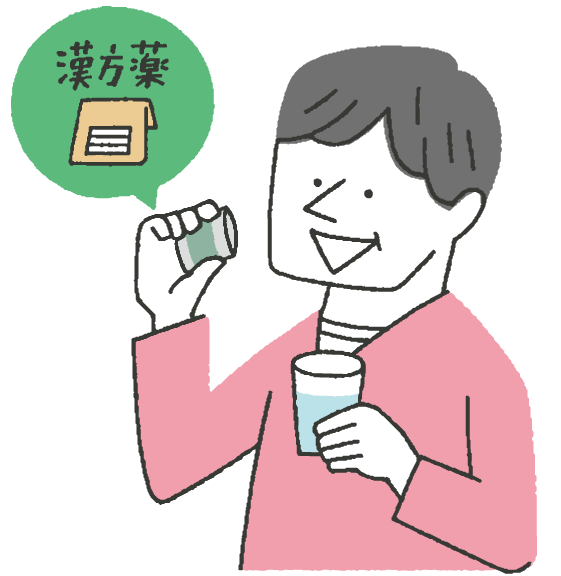 漢方薬を飲んでいる男性